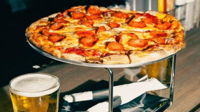 1/2 Priced Pizzas and $2 Tallboys