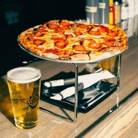 1/2 Priced Pizzas and $2 Tallboys