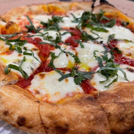 Enjoy National Pizza Day with a Local Slice